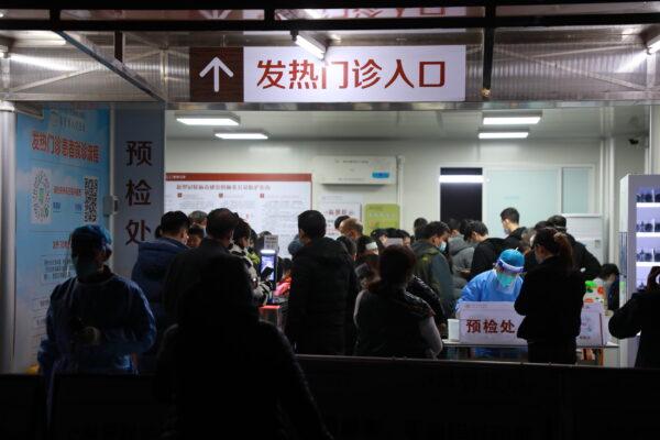 Patients wait to see the doctors at a fever clinic of Dongguan People's Hospital in Dongguan, Guangdong Province of China, on Dec. 20, 2022. (VGC/VCG via Getty Images)