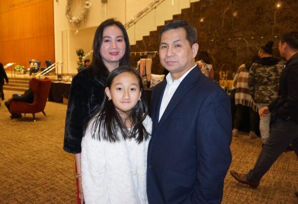 English professor Leo Lee and his family at the Dec. 26, 2022, evening performance of Shen Yun Performing Arts at the Atlanta Symphony Hall. (Nancy Ma/The Epoch Times)
