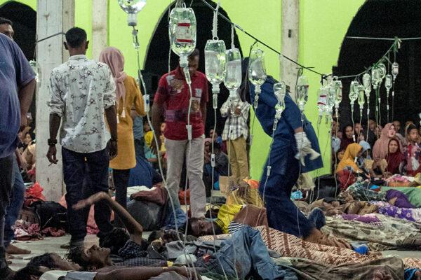Rohingya refugees receive medical treatment at a temporary shelter in Pidie, Aceh province, Indonesia, after arriving via boat, Dec. 26, 2022. (Antara Foto/Joni Saputra/via Reuters)