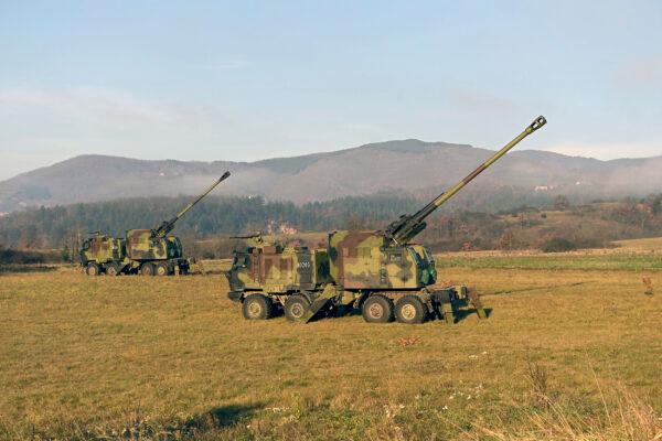 Serbian army self-propelled 155 mm howitzers near the administrative line with Kosovo, south Serbia, on Dec. 26, 2022. (Serbian Defense Ministry Press Service via AP)