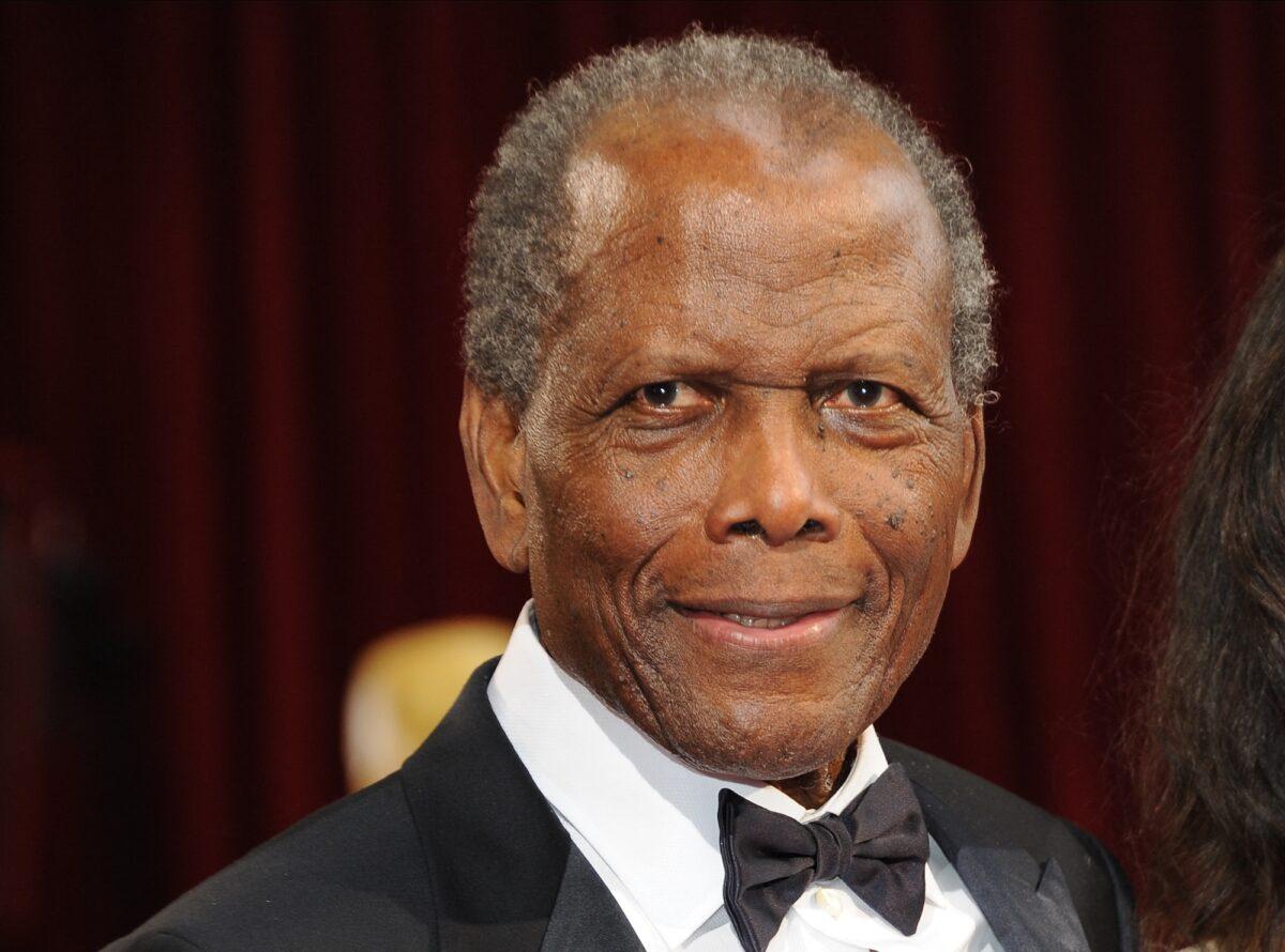 Sidney Poitier arrives on the red carpet for the 86th Academy Awards in Hollywood, Calif., on March 2, 2014. (Valerie Macon/AFP/Getty Images)