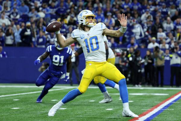 Justin Herbert (10) of the Los Angeles Chargers throws the ball against the Indianapolis Colts at Lucas Oil Stadium in Indianapolis on Dec. 26, 2022. (Michael Hickey/Getty Images)