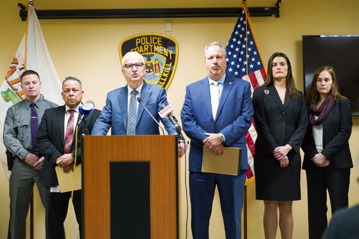 Town of Wallkill Supervisor George Serrano (2nd L), Wallkill Police Chief Robert Hertman (3rd L), and County District Attorney David Hoovler (3rd R) at a press conference to announce the indictment of Gionni Sellers at Wallkill Police Department in N.Y. on Dec. 27, 2022. (Cara Ding/The Epoch Times)