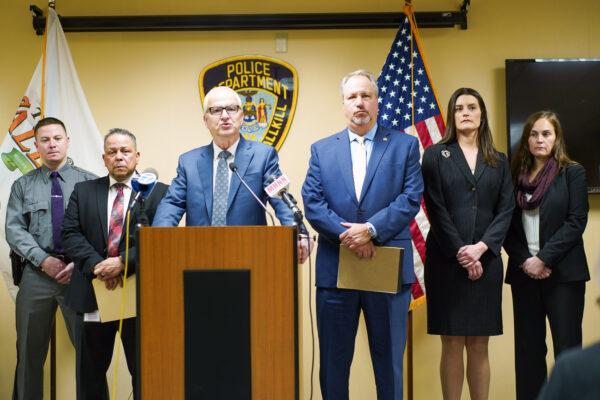 Town of Wallkill Supervisor George Serrano (2nd L), Wallkill Police Chief Robert Hertman (3rd L), and County District Attorney David Hoovler (3rd R) announce the indictment of Gionni Sellers at Wallkill Police Department in New York on Dec. 27, 2022. (Cara Ding/The Epoch Times)