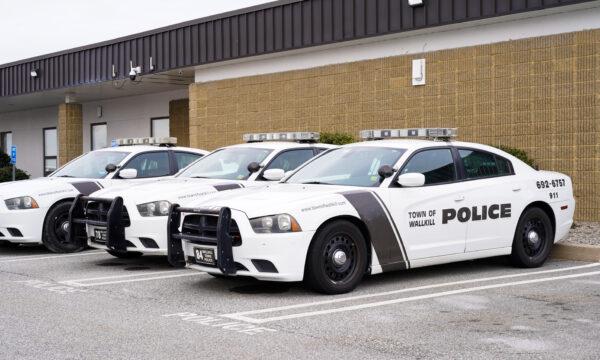 Squad cars parked outside Wallkill Police Department in N.Y. on Dec. 27, 2022. (Cara Ding/The Epoch Times)