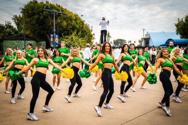 University of Oregon marching band and cheerleaders perform for SeaWorld park guests in Mission Bay, Calif., on Dec. 27, 2022—before the school's appearance in the Holiday Bowl on Dec. 28 (Courtesy of SeaWorld San Diego)