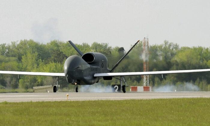 An RQ-4 Global Hawk drone lands at Grand Forks Air Force Base in North Dakota. (Johnny Saldivar/Wikimedia Commons)