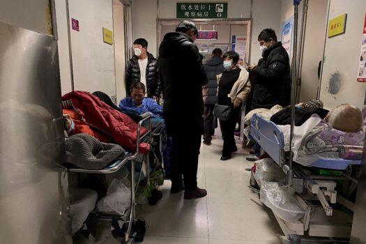 COVID-19 patients on gurneys at Tianjin First Center Hospital in Tianjin, China, on Dec. 28, 2022. (Noel Celis/AFP via Getty Images)