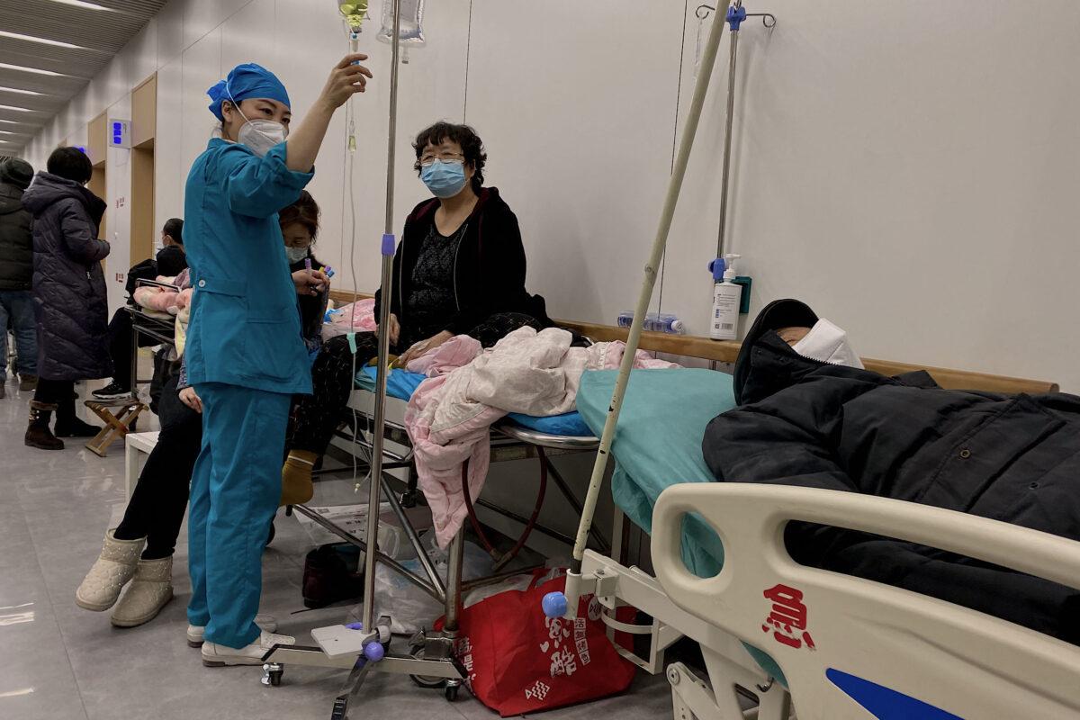 This picture shows COVID-19 patients on beds at Tianjin Nankai Hospital in Tianjin, China, on Dec. 28, 2022. (Noel Celis/AFP via Getty Images)