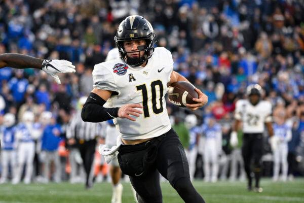 UCF quarterback John Rhys Plumlee (10) runs the ball during the second half of the Military Bowl NCAA college football game against Duke in Annapolis, Md., on Dec. 28, 2022. (Terrance Williams/AP Photo)