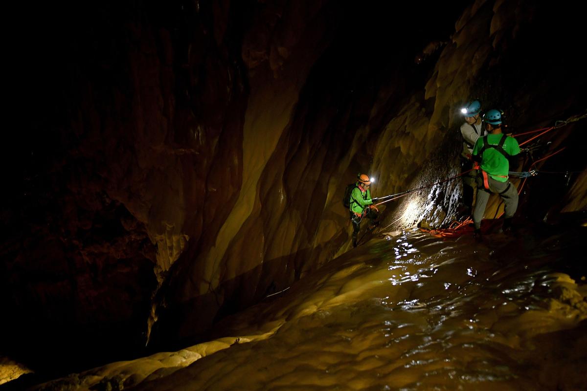 Visitors climb during a tour of Son Doong cave. (Nhac Nguyen/AFP via Getty Images)