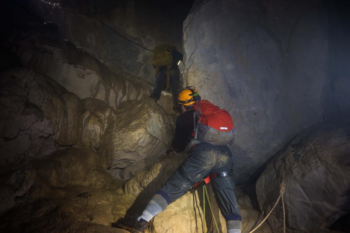 Cavers climb inside Son Doong cave. (Vietnam Stock Images/Shutterstock)