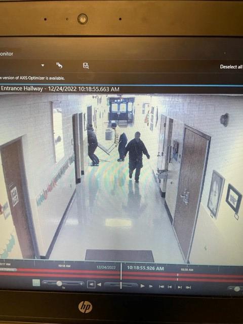 Screengrab from surveillance video showing people sheltering at the Pine Hill School in Cheektowaga, New York, on Dec. 24, 2022. (Courtesy of Cheektowaga Police Department)