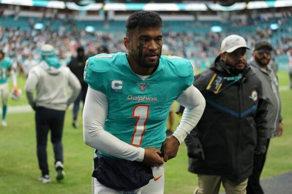Miami Dolphins quarterback Tua Tagovailoa (1) walks off the field after an NFL football game against the Green Bay Packers in Miami Gardens, Fla., on Dec. 25, 2022. (Jim Rassol/AP Photo)