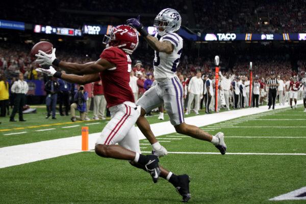 Jermaine Burton (3) of the Alabama Crimson Tide catches a touchdown pass over Julius Brents (23) of the Kansas State Wildcats during the third quarter of the Allstate Sugar Bowl at Caesars Superdome in New Orleans on Dec. 31, 2022. (Sean Gardner/Getty Images)
