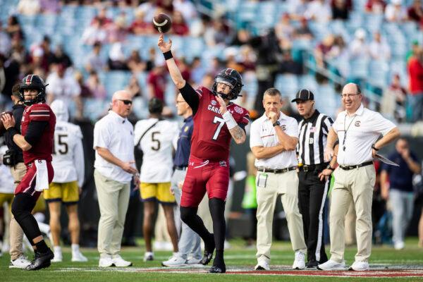 Spencer Rattler (7) of the South Carolina Gamecocks warms up before the start of the game against the Notre Dame Fighting Irish at TIAA Bank Field in Jacksonville, Fla., on Dec. 30, 2022. (James Gilbert/Getty Images)