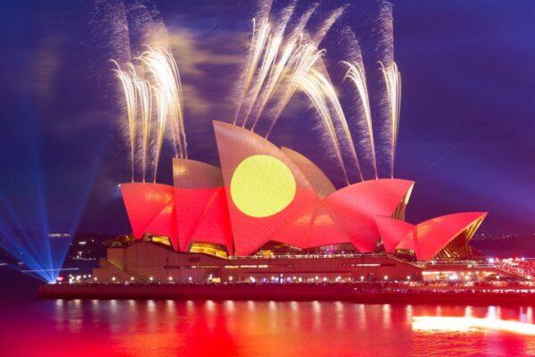 This picture shows the Opera House illuminated in the colours of the Aboriginal flag in Sydney on Australia Day on Jan. 26, 2023. (Robert Wallace/AFP via Getty Images)