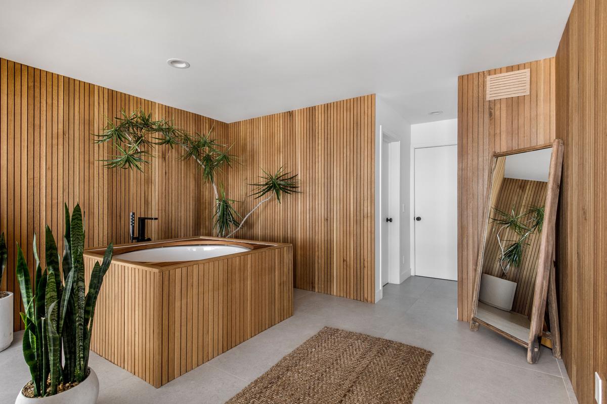 The spa-quality bathrooms in the master suites feature generous use of wood accents to capture the California beach lifestyle. (The Luxury Level, Toptenrealestatedeals.com)