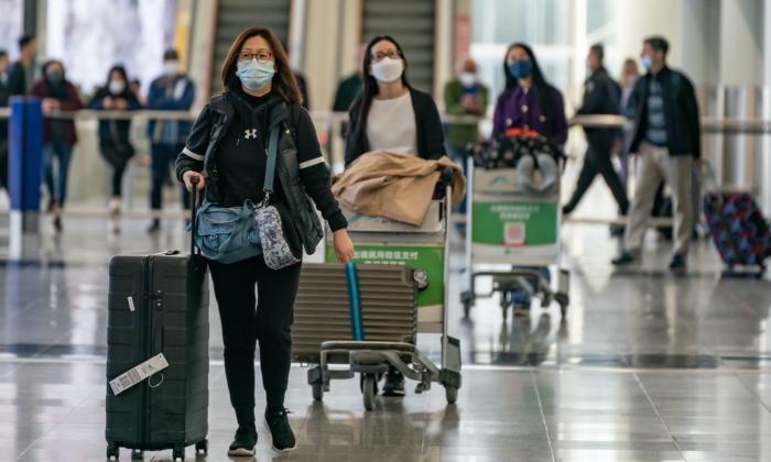Chinese State Media Plays Down Severity of COVID-19 as More Countries Roll out Travel Curbs