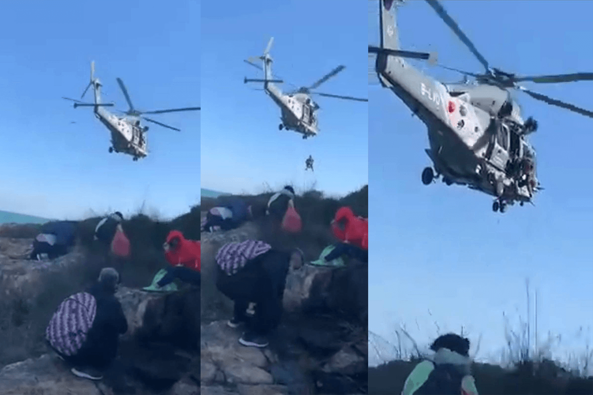 In these stills taken from video a woman is seen being air lifted to hospital by the The Hong Kong government's rescue helicopter in Hong Kong on Dec. 25, 2022. (Cyrus Chow via Facebook/Screenshot via The Epoch Times/)