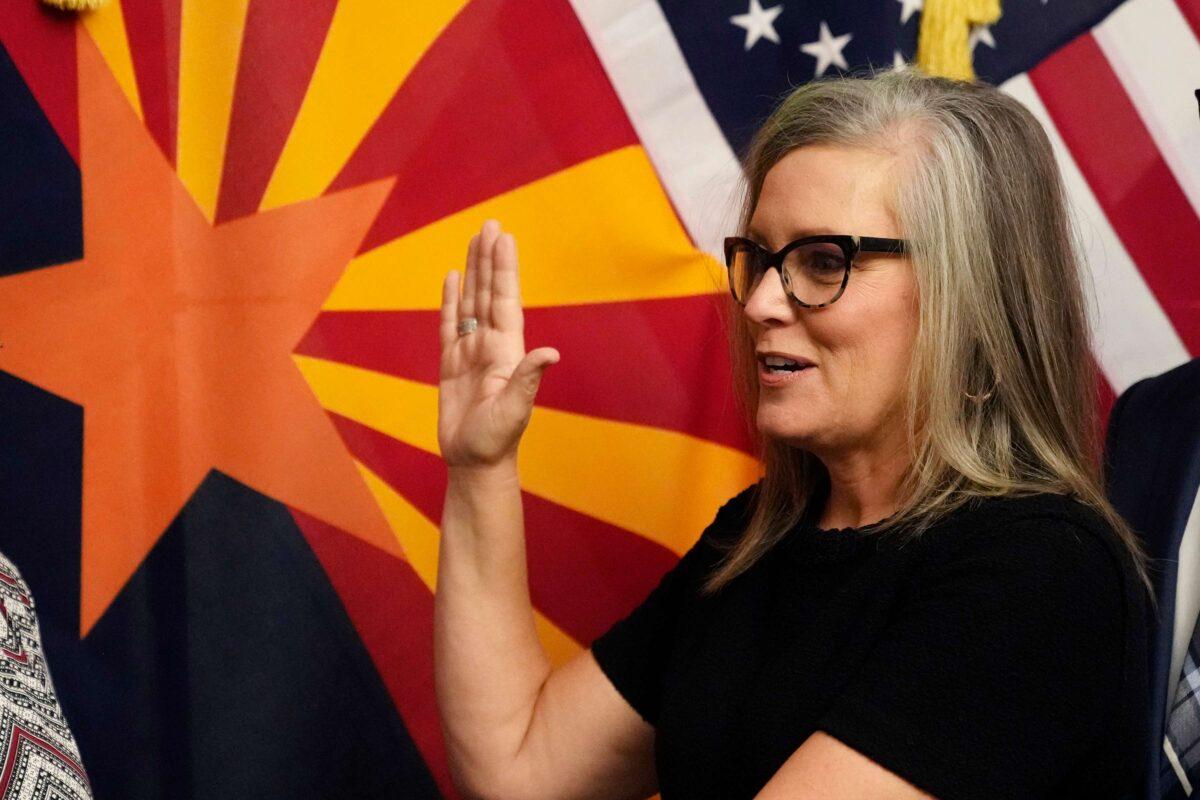 The new Arizona Democratic Gov. Katie Hobbs takes the oath of office in a ceremony at the state Capitol in Phoenix on Jan. 2, 2023. (Ross D. Franklin, Pool/AP Photo)