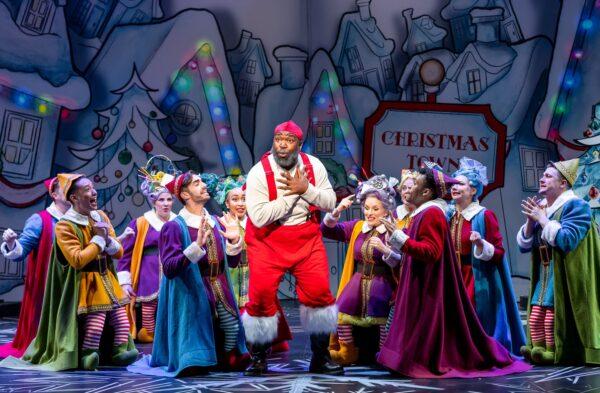 Santa Claus (A.D. Weaver) and his elves in “Elf-the Musical.” (Drury Lane Theatre)