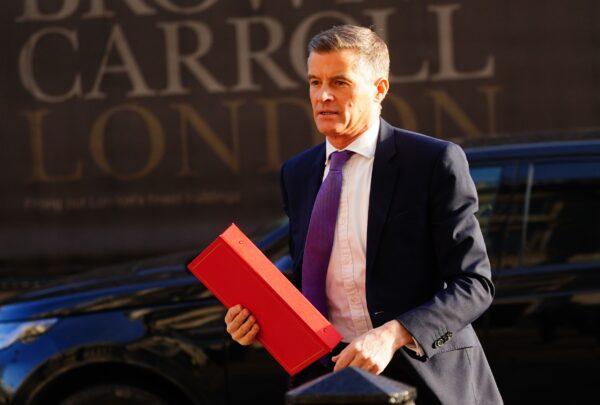 Transport Secretary Mark Harper arrives for a government COBRA emergency committee meeting at the Cabinet Office in London, on Dec. 14, 2022. (Victoria Jones/PA Media)