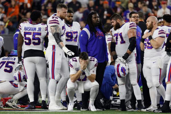 Buffalo Bills players react after teammate Damar Hamlin #3 collapsed during a game against the Cincinnati Bengals at Paycor Stadium in Cincinnati, Ohio, on Jan. 2, 2023. (Kirk Irwin/Getty Images)