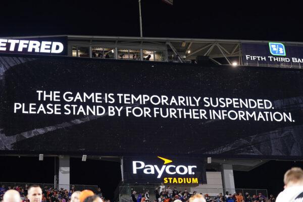 An announcement is displayed on the scoreboard after the game was temporarily suspended following the collapse of Damar Hamlin #3 of the Buffalo Bills after making a tackle against the Cincinnati Bengals at Paycor Stadium in Cincinnati, Ohio, on Jan. 2, 2023. (Dylan Buell/Getty Images)