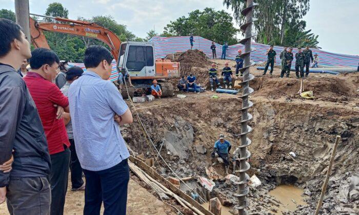 Rescuers Try to Save 10-Year-Old Boy Trapped in Concrete Hole in Vietnam