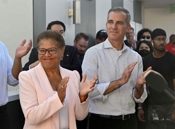 Then-Mayor Eric Garcetti and U.S. Rep. Karen Bass visit a Homekey site along Pico Boulevard as he announces awards for homeless housing projects across the state in Los Angeles on Aug. 24, 2022. (Keith Birmingham/The Orange County Register via AP)