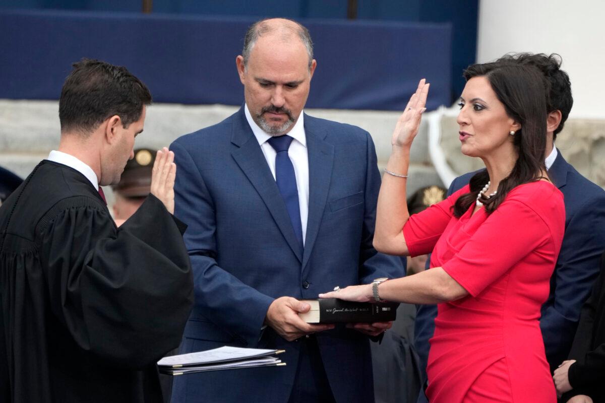 Florida Lt. Gov. Jeanette Nunez (R) is sworn in by Justice John Curiel, as her husband, Adrian, (C) looks on during an inauguration ceremony at the Old Capitol in Tallahassee, Fla., on Jan. 3, 2023. (AP Photo/Lynne Sladky)