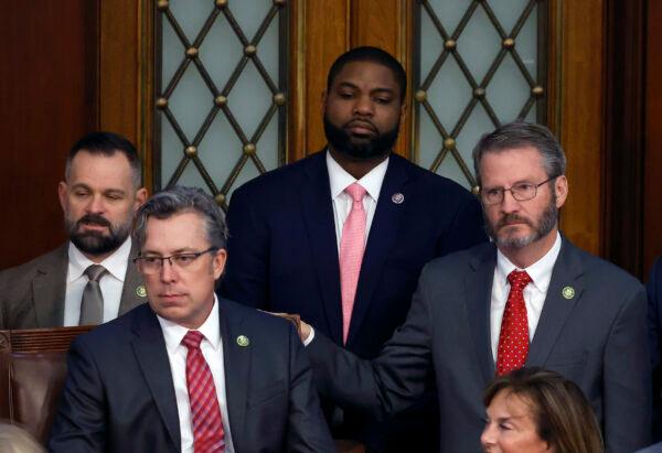 Rep.-elect Byron Donalds (R-Fla.) (C), Rep.-elect Andy Ogles (R-Tenn.) (L), and Rep.-elect Tim Burchett (R-Tenn.) (R) watch proceedings in the House Chamber during the third day of elections for Speaker of the House at the U.S. Capitol Building in Washington on Jan. 5, 2023. (Chip Somodevilla/Getty Images)