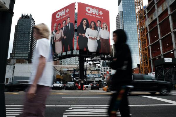 An advertisement for CNN+ is displayed in Manhattan on April 21, 2022, in New York City. Only three weeks after its launch, CNN announced that its new streaming service would be shut down. (Spencer Platt/Getty Images)