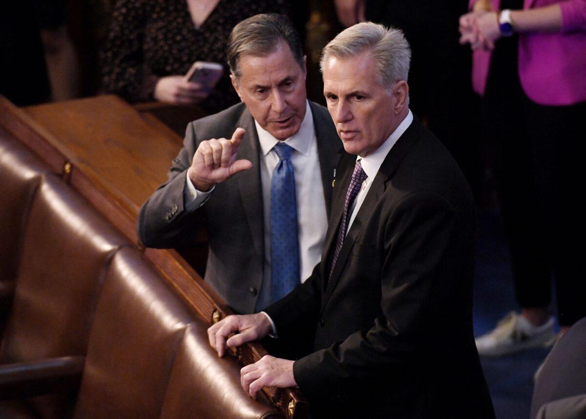 Rep. Kevin McCarthy (R-Calif.) speaks with a colleague as the House of Representatives continues voting for new speaker at the U.S. Capitol in Washington, on Jan. 4, 2023. (Olivier Douliery/AFP via Getty Images)