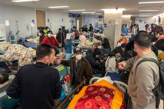 Patients on stretchers are seen at Tongren hospital in Shanghai on Jan. 3, 2023. (Hector Retamal/AFP via Getty Images)