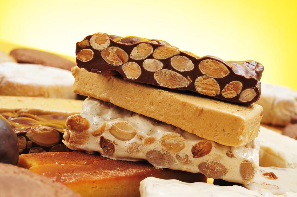 Turrón, a Spanish sweet made of toasted almonds and nougat, has been revered on the Iberian Peninsula for over a thousand years. (nito/Shutterstock)