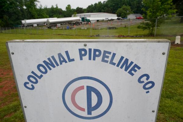 Tanker trucks are parked near the entrance of Colonial Pipeline Company in Charlotte, N.C., on May 12, 2021. (Chris Carlson/AP Photo)