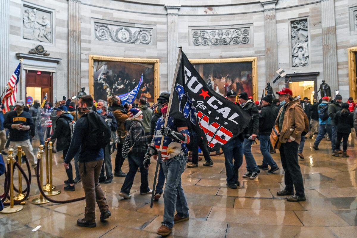 Protesters roam through the U.S. Capitol Rotunda after breaching the building on Jan. 6, 2021. (Saul Loeb/AFP via Getty Images)