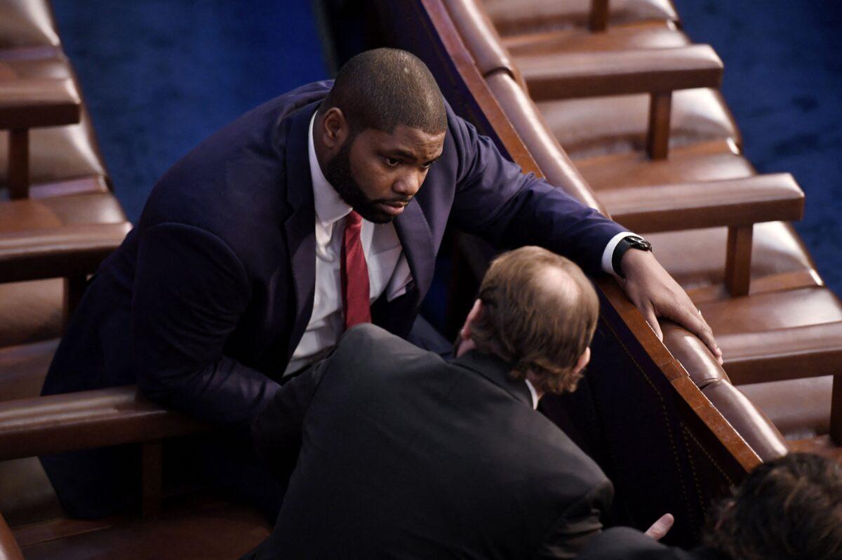 US Republican Representative of Florida Byron Daniels speaks with a colleague after the 12th vote for House Speaker at the US Capitol in Washington on Jan. 6, 2023. (OLIVIER DOULIERY/AFP via Getty Images)