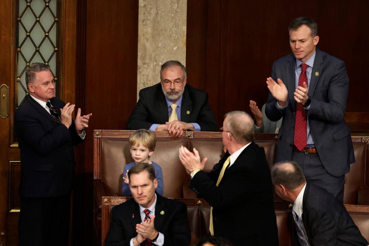 Rep.-elect Andy Harris (R-Md.) (C) receives applause from his fellow Republicans after switching his vote for Speaker of the House to Republican leader Kevin McCarthy (R-Calif.) during the fourth day of elections at the U.S. Capitol Building in Washington on Jan. 6, 2023. (Anna Moneymaker/Getty Images)