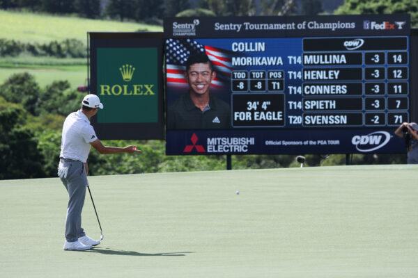 Collin Morikawa of the United States reacts to a missed putt for birdie on the 18th green during the first round of the Sentry Tournament of Champions at Plantation Course at Kapalua Golf Club in Lahaina, Hawaii, on Jan. 5, 2023. (Harry How/Getty Images)