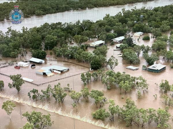 A supplied image obtained on Jan. 6, 2023, shows an aerial view of flooding at Fitzroy crossing in the Kimberley region of Western Australia. A 50-kilometre-wide inland sea is surging towards the Kimberley coast after the swollen Fitzroy River devastated the town of Fitzroy Crossing earlier in the week. (AAP Image/Supplied by Western Australia Police Force)