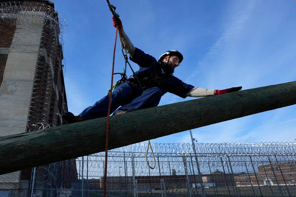 Prisoner Scott Steffes works on climbing at the Parnall Correctional Facility's Vocational Village in Jackson, Mich., on Dec. 1, 2022. (Paul Sancya/AP Photo)