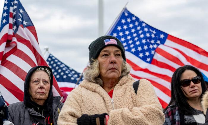 Micki Witthoeft (C), mother of Ashli Babbitt, who was killed on Jan. 6, 2021, stands with supporters of Jan. 6 defendants outside the U.S. Supreme Court on the second anniversary of the Jan. 6, 2021, Capitol breach. (Tasos Katopodis/Getty Images)