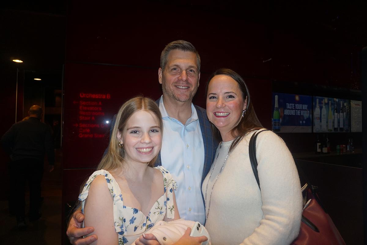 Steve and Julie Gossett, with their daughter, at the Winspear Opera House, in Dallas, on Jan. 6, 2022. (Yeawen Hung/The Epoch Times)