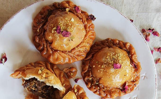 Pistachio and Apricot Pastries (Chandrakala) in Rose Syrup