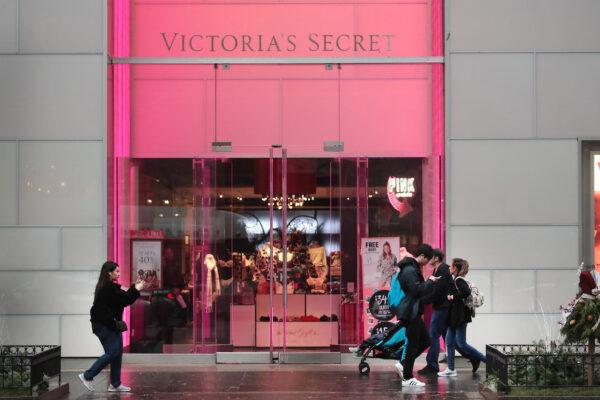 CHICAGO, ILLINOIS - NOVEMBER 21: Shoppers walk past a Victoria's Secret store along the Magnificent Mile on November 21, 2019 in Chicago, Illinois. According to the parent company L Brands, sales dropped 7 percent at Victoria's Secret stores open for at least a year during the latest quarter compared with the same period last year. (Photo by Scott Olson/Getty Images)