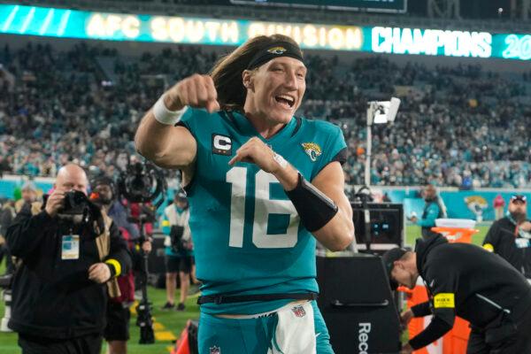 Jacksonville Jaguars quarterback Trevor Lawrence (16) celebrates after defeating the Tennessee Titans 20–16, in an NFL football game, in Jacksonville, Fla., on Jan. 7, 2023. (John Raoux/AP Photo)