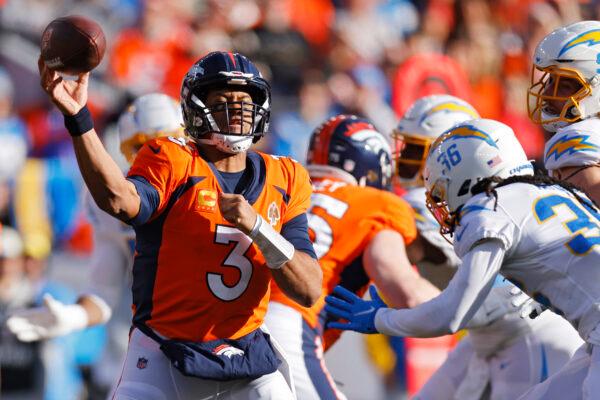 Russell Wilson (3) of the Denver Broncos attempts a pass during the first quarter against the Los Angeles Chargers at Empower Field At Mile High in Denver on Jan. 8, 2023. (Justin Edmonds/Getty Images)